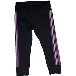 Black exercise leggings with purple and white trim, size S.